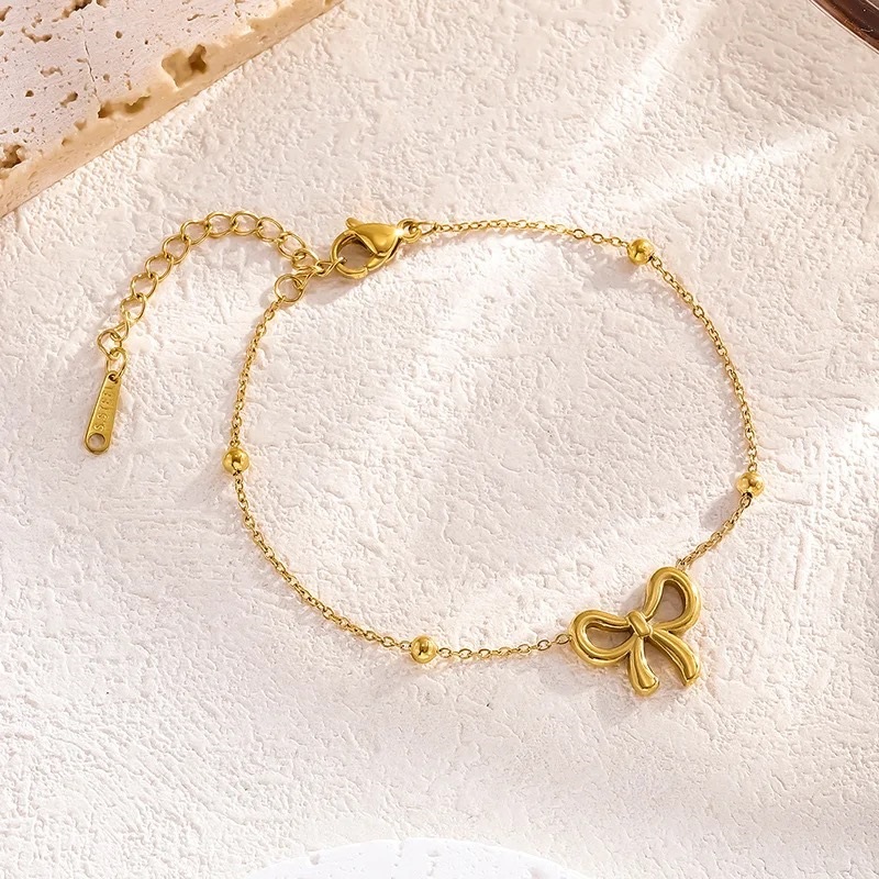 Luxury Jewelry Gold Plated Hollowed Out Stainless Steel Bow Adjustable Chain bracelet